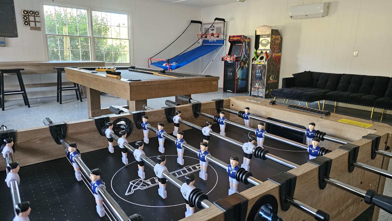 Modern game room with arcade games
